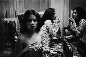 Pablo Bartholomew | Karen Lunel and Sharon Prabhakar in a dressing room, New Delhi | c. 1976 | Archival pigment print. Edition 10 + 3 AP | 16 x 24 Inches