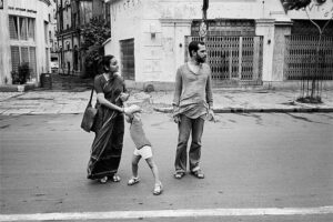 Pablo Bartholomew | Ammu Chelam tries to manage a bratty Pablo while husband Dhritiman looks away, Calcutta | c. 1982 | Archival pigment print. Edition 10 + 3 AP | 16 x 24 Inches