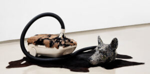 Bharti Kher | Hungry Dogs Eating Dirty Pudding | 2004 | Fiberglass & plastic | 18 x 30 x 40 Inches ;